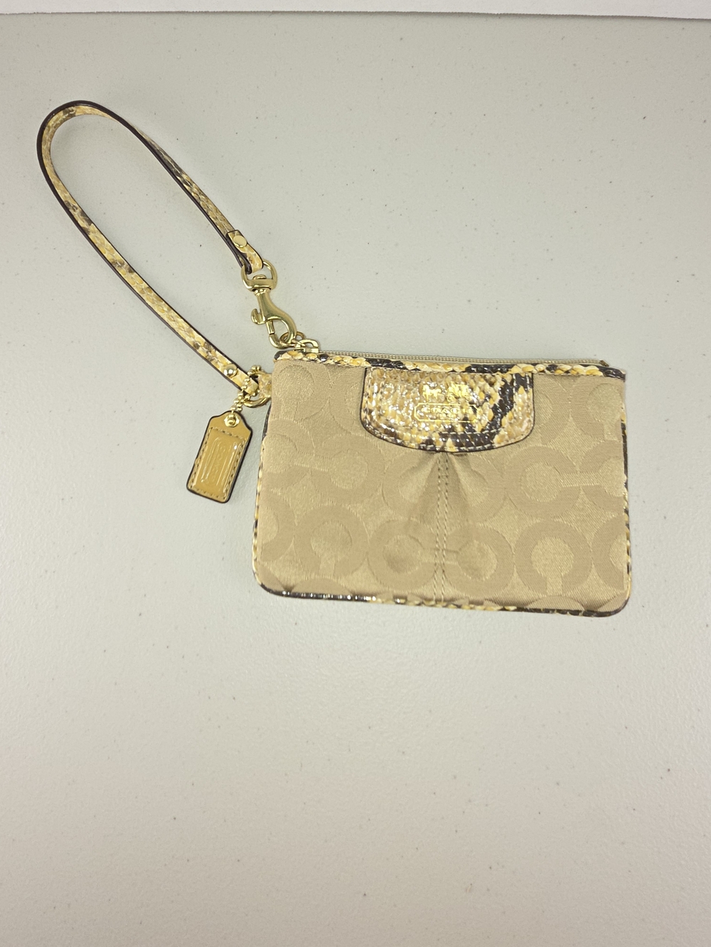 Coach Signature Wristlet in Beige with Gold Snake-Trim Like New